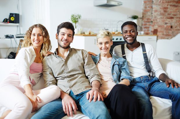 4 people on a couch.